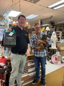 Ricky Lawson, owner of Ben Gue Antiques & Gifts had a special friend to meet Darren during his visit.