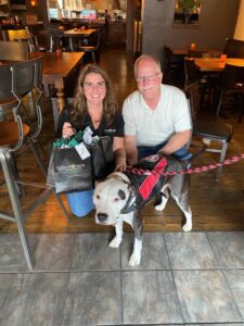 While visiting Lorenzo's Brick Oven Café, Amy Yingling ran into Mount Airy Mayor Larry Hushour and Remington - who can detect blood sugar levels and seizures.