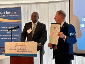 Sec. Kevin Anderson (Maryland Dept. of Commerce) presents Richard Griffin, CEcD, President of MEDA with the Governor's proclamation of Economic Development Week.