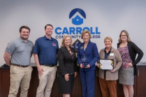 Image of Denise Beaver, Director, Carroll County Economic Development, Darren Peyton, Regional Director, Small Business Development Center, and Jacob Fernandez, with Carroll County Workforce Development., present the Pillar Award to Dr. Rosalie Mince, along with Kelly Koermer, Kristie Crumley, and Steven Berry. Credit: Photo by Andrew Mangum for Carroll Community College