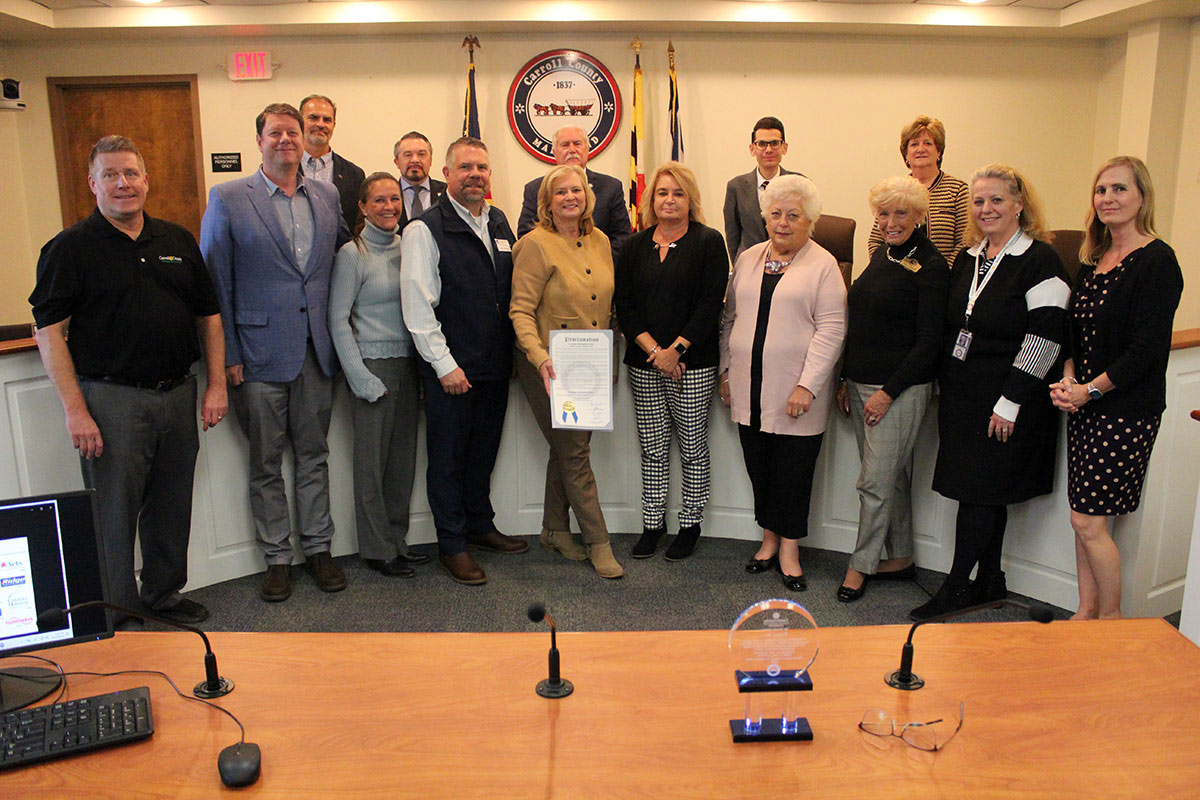 Image of Economic Development staff receiving a proclamation for Economic Development Week from the County Commissioners.