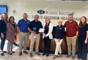 Image of Knorr staff being presented the Pillar Award. Lindsey Franey – Marketing and Governmental Affairs Mgr., Tami Sheppard – Human Resources Business Partner, Stan Whiteman - Econ Dev, Matt Shick – VP HR, Paige Sunderland - Econ Dev, Jane Sewell - Econ Dev, Trey Reese - Human Resources Generalist, Kaitlyn Wolfe –Communications Specialist.