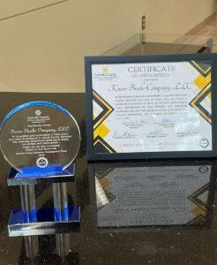 Image of the Knorr Brake pillar award and certificate.